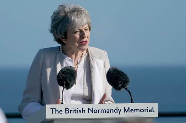 Prime Minister Theresa May at the inauguration of the British Normandy Memorial site in Ver-sur-Mer, France, during commemorations for the 75th anniversary of the D-Day landings. Picture: Owen Humphreys/PA Wire