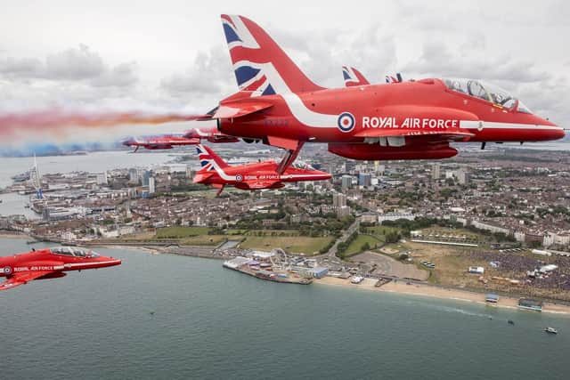 The Ministry of Defence of the Royal Air Force Aerobatic Team, The Red Arrows flying over the commemorations at Southsea Common in Portsmouth for the 75th Anniversary of the D-Day landings.