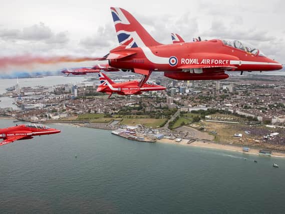 The Ministry of Defence of the Royal Air Force Aerobatic Team, The Red Arrows flying over the commemorations at Southsea Common in Portsmouth for the 75th Anniversary of the D-Day landings.