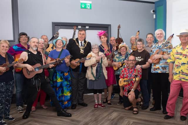 Pictured is: Lord Mayor David Fuller and Mrs Leza Tremorin with founder or the Pompey Pluckers Linda Wilson. (centre).Picture: Keith Woodland (090619-42)
