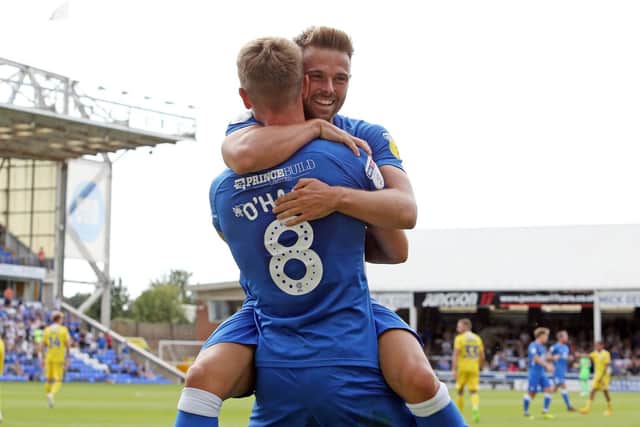 Pompey target Matt Godden (facing camera) celebrates a Peterborough goal against Bristol Rovers. (Picture: Joe Dent/JMP)