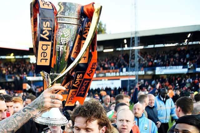 LUTON, ENGLAND - MAY 04: Glen Rea and teammate Sonny Bradley of Luton Town celebrate their side winning the league after the Sky Bet League One match between Luton Town and Oxford United at Kenilworth Road on May 04, 2019 in Luton, United Kingdom. (Photo by Nathan Stirk/Getty Images)