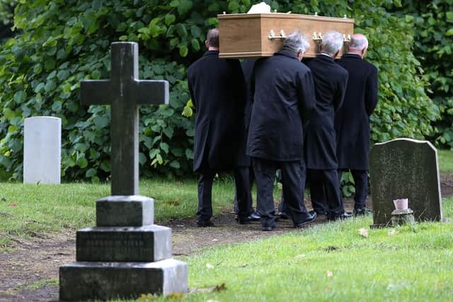 Pall-bearers carry the coffin of Jeremy Kyle guest Steve Dymond at his funeral in Kingston Cemetery, Portsmouth. Picture: Andrew Matthews/PA Wire