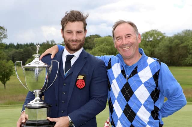 Hayling's Toby Burden winner of the 114th Hampshire, Isle of Wight and Channel Islands Amateur Championship holding the Sloane Stanley Challenge Cup with his dad, at Army GC, on Sunday, June 9, 2019.Picture: Andrew Griffin. AMG Pictures