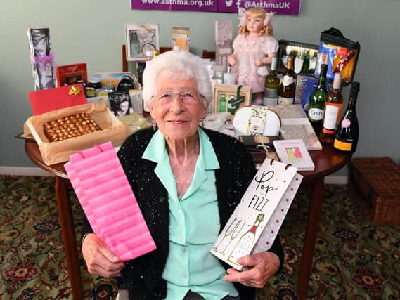 Joyce Taylor at her Purbrook home with some of the prizes that have been donated for her 90th birthday raffle. Picture: Malcolm Wells (190610-2148)