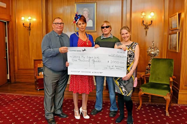 The Lady Mayoress of Portsmouth Leza Tremorin presented Losing Our Sight a cheque for 1,000 on behalf of The Lord Mayor from his 'City of Portsmouth Lord Mayor's Appeal Fund'. From left, Losing My Sight founder Dave Taylor, Lady Mayoress Leza Tremorin, David Shervill, and Losing My Sight director Elena Sommers
Picture: Malcolm Wells (190613-2526)