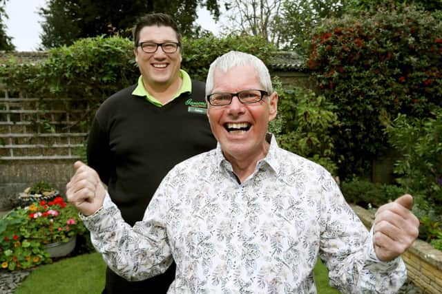Bloomin' Marvellous 2018 winner Ray Hunt, right, and plantsman Callum Hartley from Garsons of Titchfield, in Mr Hunt's Waterlooville garden. Picture: Chris Moorhouse