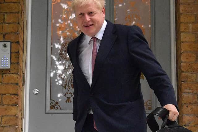 Conservative MP Boris Johnson leaves a house in London on. Photo: Daniel Leal-Olivas/AFP/Getty Images