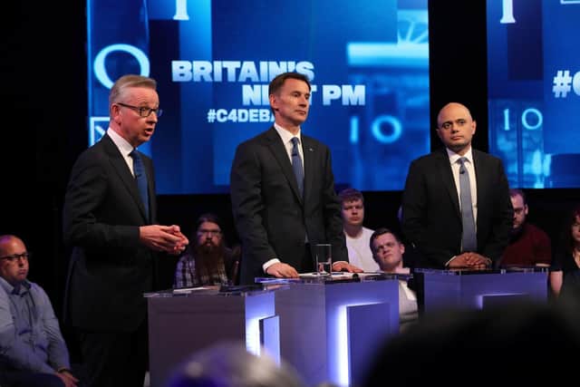 Michael Gove, left, with Jeremy Hunt and Sajid Javid, right, during the live television debate on Channel 4 for the candidates for leadership of the Conservative party, at the Here East studios in Stratford, east London. Photo Tim Anderson/Channel 4/PA Wire