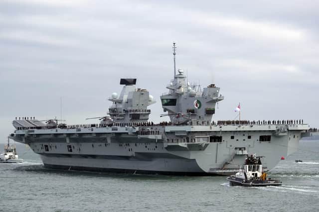 HMS Queen Elizabeth will be setting sail from Portsmouth once again today ahead of her second trip to America later this year. Photo: Steve Parsons/PA Wire