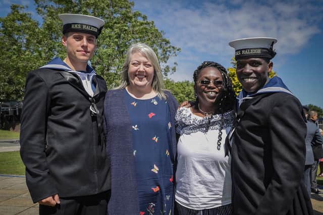 Now-HMS Sultan recruit Cameron Hawes his mum Sarah Hole, Althea Crosby, and her son Quaci Crosby of HMS Raleigh, who was stunned to see his mum at the passing-out parade. Picture: Mark Johnson/Royal Navy