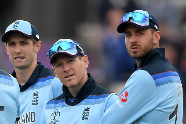 James Vince, right, with Chris Woakes, left and Eoin Morgan. Picture: Alex Davidson/Getty Images
