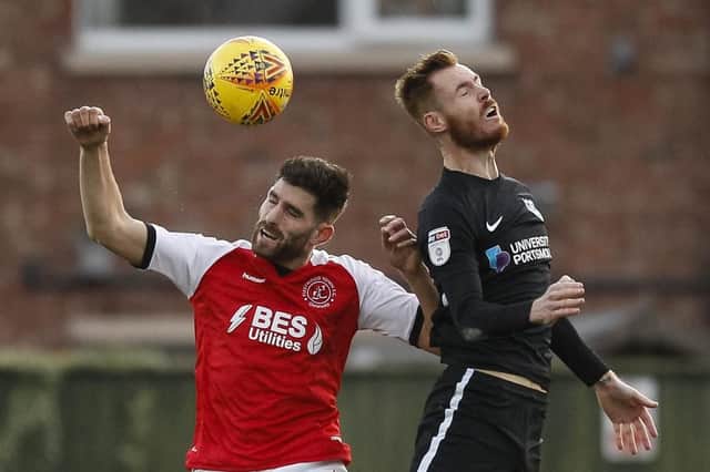 Ched Evans challenges Tom Naylor during Pompey's 5-2 victory at Fleetwood in December 2018. Picture: Daniel Chesterton/phcimages.com/PinPep