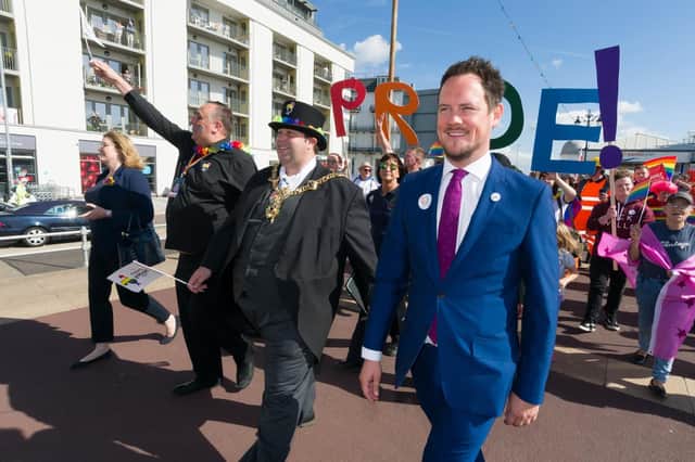 Portsmouth South MP Stephen Morgan, right, at Portsmouth Pride in 2018. From left, Portsmouth North MP Penny Mordaunt, Councillor David Fuller and then-Lord Mayor of Portsmouth Cllr Lee Mason with the Pride procession behind them in Southsea.