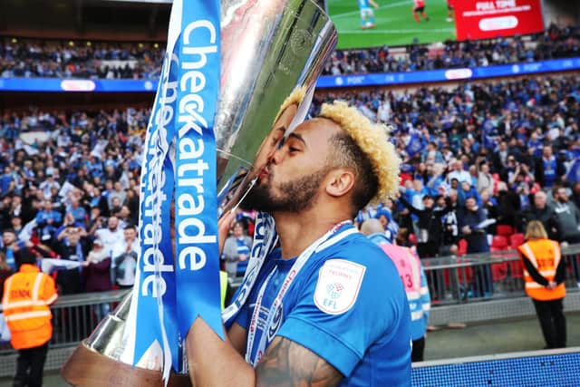Anton Walkes celebrates with the Checkatrade Trophy. Picture: Joe Pepler