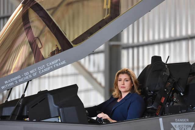 Defence Secretary Penny Mordaunt sits in the cockpit of a F-35 Lightning jet at RAF Akrotiri in Cyprus to mark the jets first deployment overseas. Picture: Jacob King/PA Wire