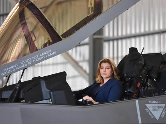 Defence Secretary Penny Mordaunt sits in the cockpit of a F-35 Lightning jet at RAF Akrotiri in Cyprus to mark the jets first deployment overseas. Picture: Jacob King/PA Wire