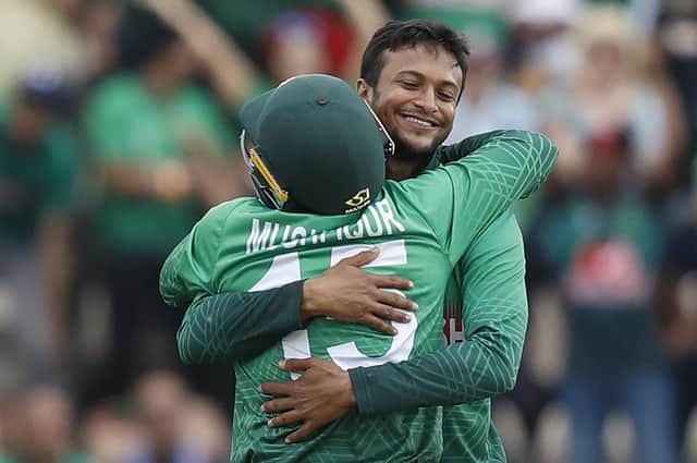 Bangladesh's Shakib Al Hasan, right, celebrates with team-mate Mushfiqur Rahim after the dismissal of Afghanistan's Najibullah Zadran  Picture: ADRIAN DENNIS/AFP/Getty Images
