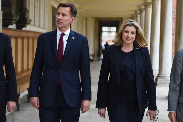 Conservative party leadership candidate Jeremy Hunt touring the Royal Hospital Chelsea, in London, accompanied by defence secretary, Penny Mordaunt. It comes after a meting with Portsmouth-based armed forces group, All Call Signs. Photo: Kirsty O'Connor/PA Wire