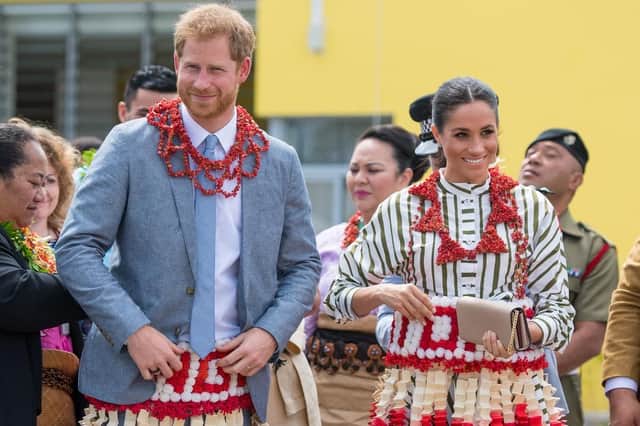 The Duke and Duchess of Sussex wearing ta'ovala during a visit to an exhibition of Tongan handicrafts during the royal couple's visit to Tonga. Picture: Dominic Lipinski/PA Wire