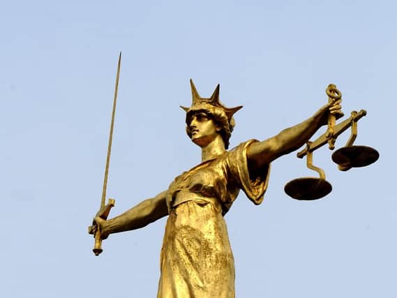 File photo of the famous statue of Lady Justice by the British sculptor, Frederick William Pomeroy, which stands on the dome of the Central Criminal Court, Old Bailey. Picture: Ian Nicholson/PA Wire