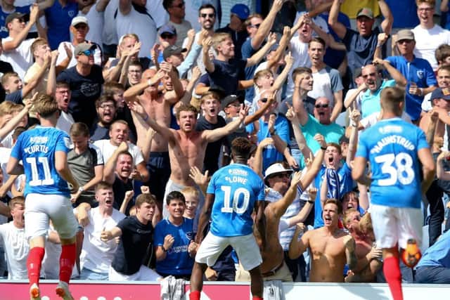 Fans celebrate at Fratton Park. Picture: Andrew Fosker/PinPep