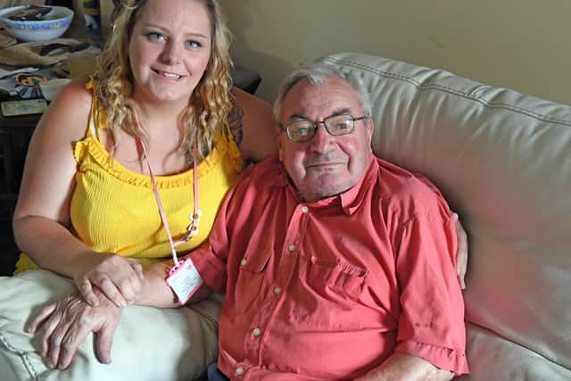 Carer Sarah-Louise Page and Brian Marshall reunited at the pensioner's home, after a dramatic rescue on Tuesday. Picture: Malcolm Wells (190703-3756)