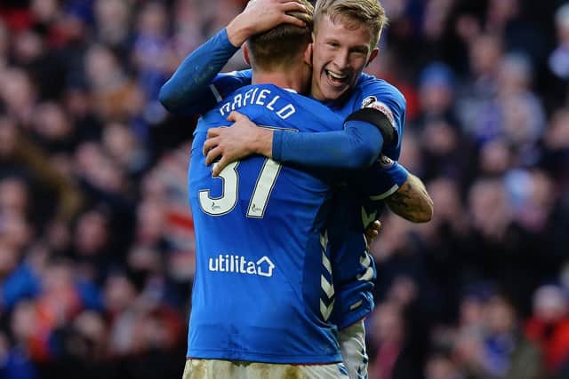 Ross McCrorie celebrates victory over Celtic in the Old Firm clash last December. Photo by Mark Runnacles/Getty Images.
