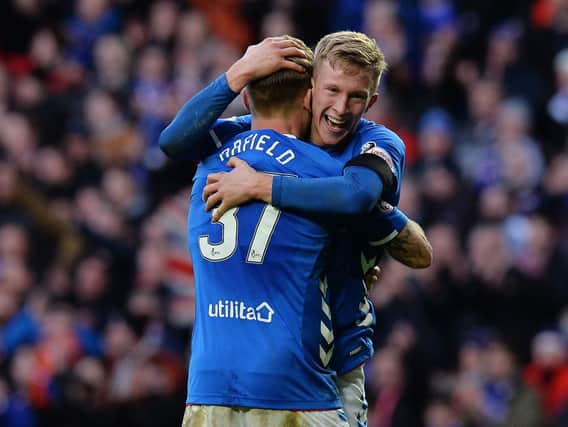 Ross McCrorie celebrates victory over Celtic in the Old Firm clash last December. Photo by Mark Runnacles/Getty Images.