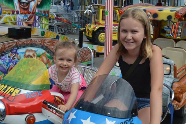 Georgiana Ballard, four, with Milla Lindberg, 13. Picture: David George