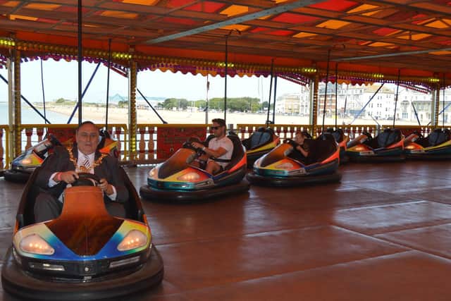 The Lord Mayor of Portsmouth being chased down on the dodgems. Picture: David George