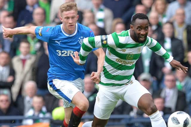 Ross McCrorie battles with Celtic forward Moussa Dembele during an Old Firm derby Picture: Mark Runnacles/Getty Image