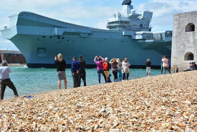 HMS Queen Elizabeth as she sailed out of Portsmouth. Picture: Ben Mitchell/PA Wire