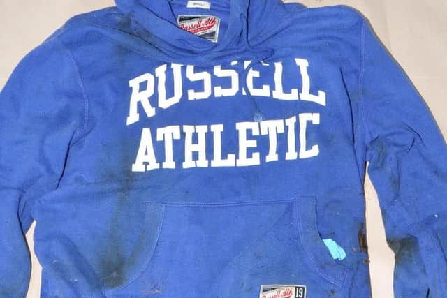 The blood-stained Russell Athletic royal blue hoodie, found  in woodland near to the body of murdered schoolgirl Lucy McHugh at Tanner's Brook, Southampton, containing DNA profiles from both Lucy and defendant Stephen Nicholson. Picture: Hampshire Constabulary/PA Wire