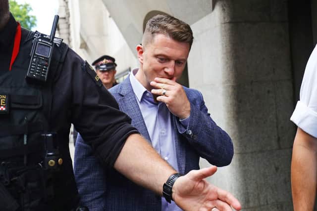Tommy Robinson outside the Old Bailey in London after being found in contempt of court by High Court judges for filming defendants in a criminal trial and broadcasting the footage on social media. Picture: Aaron Chown/PA Wire