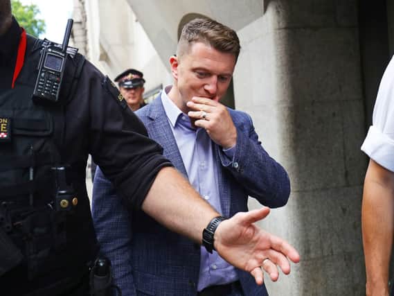 Tommy Robinson outside the Old Bailey in London after being found in contempt of court by High Court judges for filming defendants in a criminal trial and broadcasting the footage on social media. Picture: Aaron Chown/PA Wire