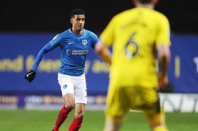 Louis Dennis - seen here against Oxford in his sole league outing for Pompey - has earned praise from Brett Pitman following Pompey's 11-0 win over UCD. Picture: Joe Pepler