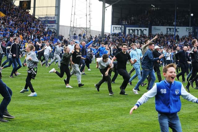 Pompey fans celebrate their 6-1 title-winning success over Cheltenham two years ago. Photo by Joe Pepler/Digital South.