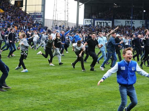 Pompey fans celebrate their 6-1 title-winning success over Cheltenham two years ago. Photo by Joe Pepler/Digital South.