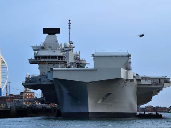 HMS Queen Elizabeth is back in Portsmouth after having problems with her propulsion and flooding. Photo: Glyn Kirk/AFP/Getty Images