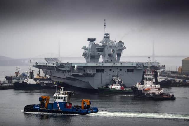 HMS Queen Elizabeth as she returned to Rosyth earlier this year for planned maintenance. Photo: MoD