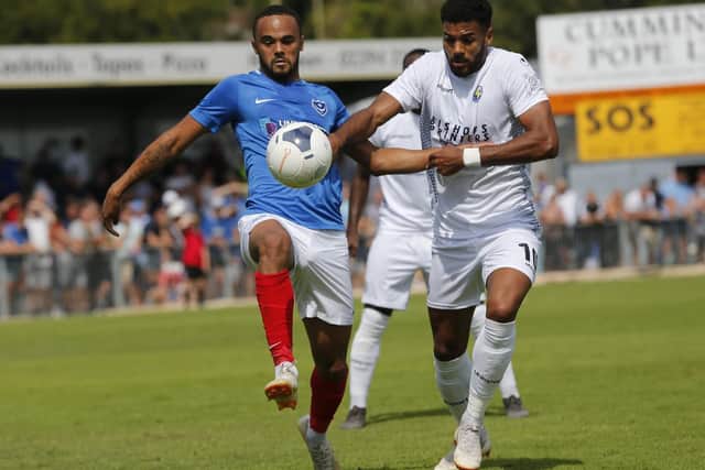Anton Walkes battles with the Hawks' Jonah Ayunga in Saturday's Westleigh Park clash. Picture: Dave Haines