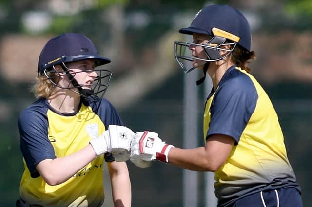 Charlie Dean, left, and New Zealand star Suzie Bates in action for Hampshire at Havant Park. Picture: Neil Marshall