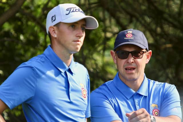 Rowlands Catles Billy McKenzie,left, with Hampshire coach Simon Andrews. Picture: Andrew Griffin/AMG Pictures