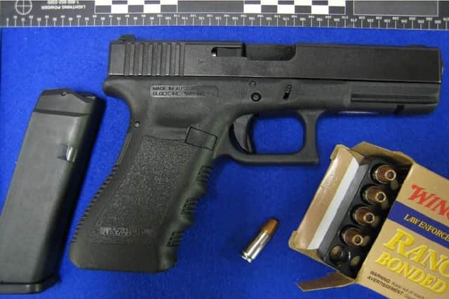 A Glock pistol and ammunition shown in evidence during the trial of Kyle Davies. Picture: South West Regional Organised Crime Unit/PA Wire