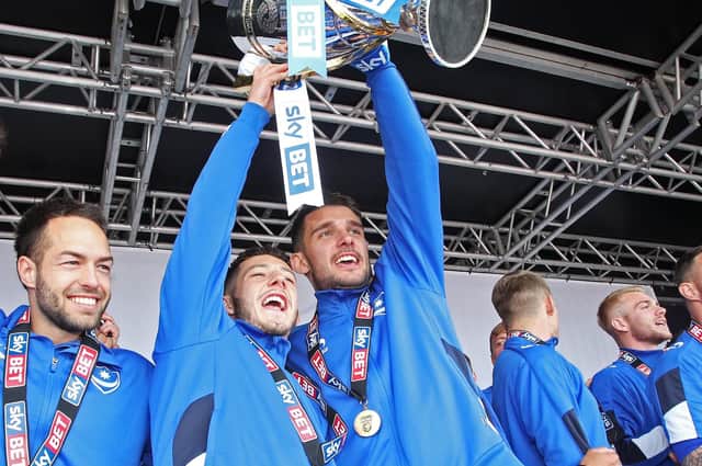 Conor Chaplin, left, and Gareth Evans celebrate Pompey's League Two title triumph in May 2017. Picture: Joe Pepler