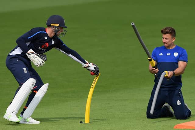 Former Hampshire wicketkeeper Michael Bates, right, works with England's Jos Buttler at the Ageas Bowl last summer. Picture: Stu Forster/Getty Images
