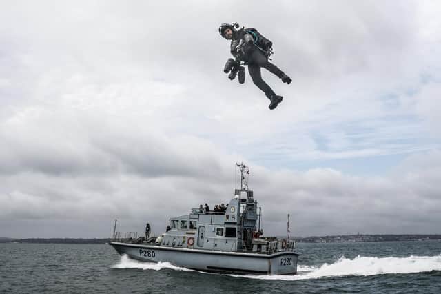 Real-life 'Ironman' flies from HMS Dasher in the Solent.  Photo: LPhot Daniel Shepherd
