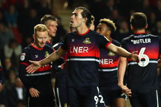 John Marquis celebrates scoring for Doncaster. Picture: Bryn Lennon/Getty Images