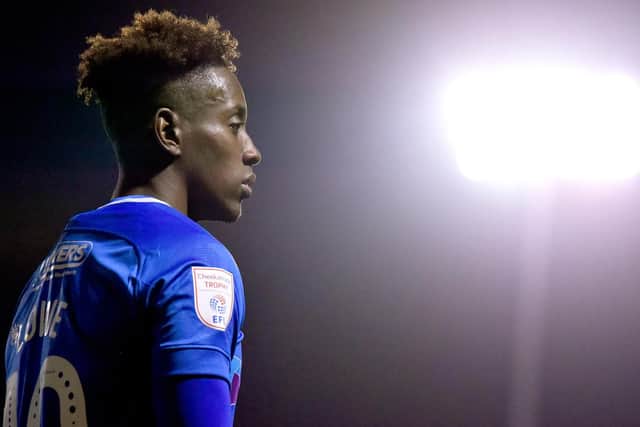 Jamal Lowe has completed his move to Wigan Athletic.